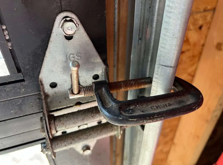 noisy garage door getting fix.