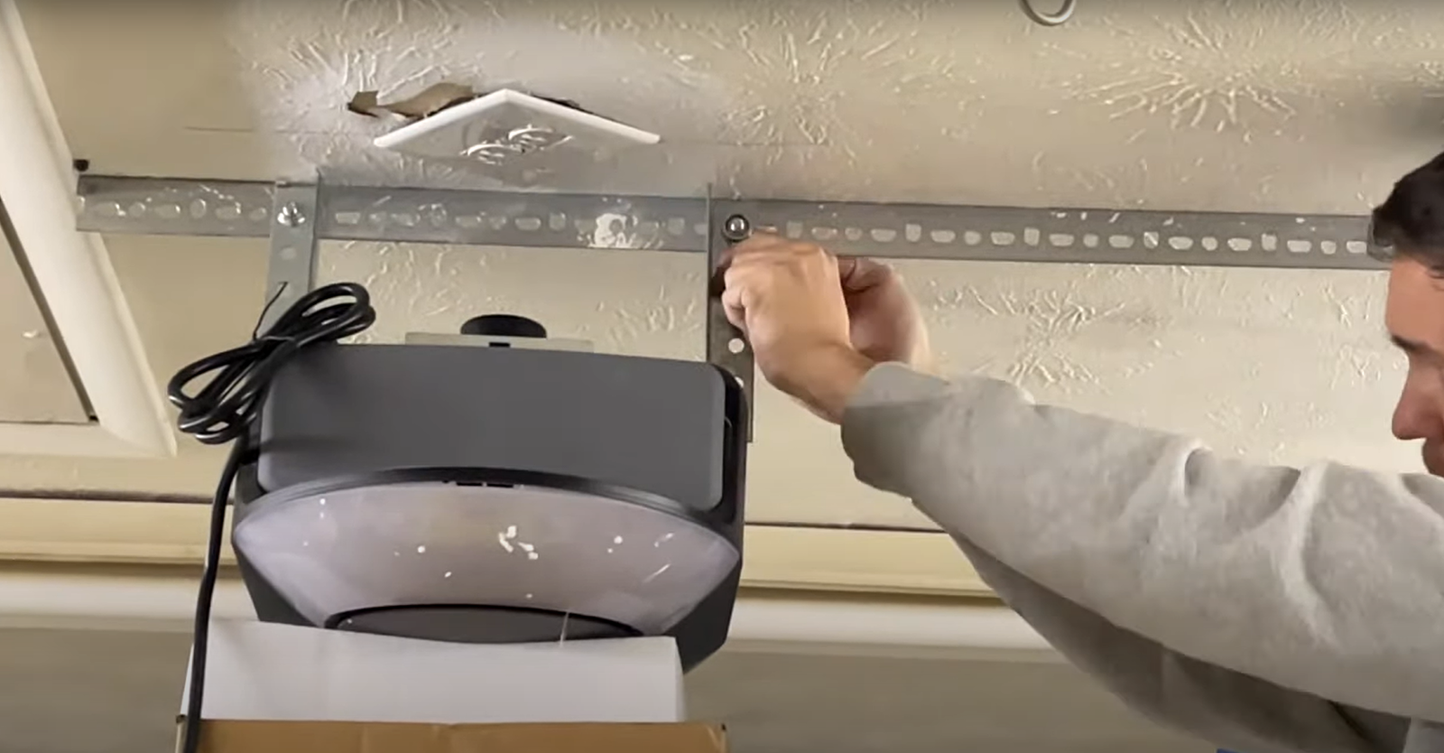 Installing new garage door opener in Sarasota, FL.