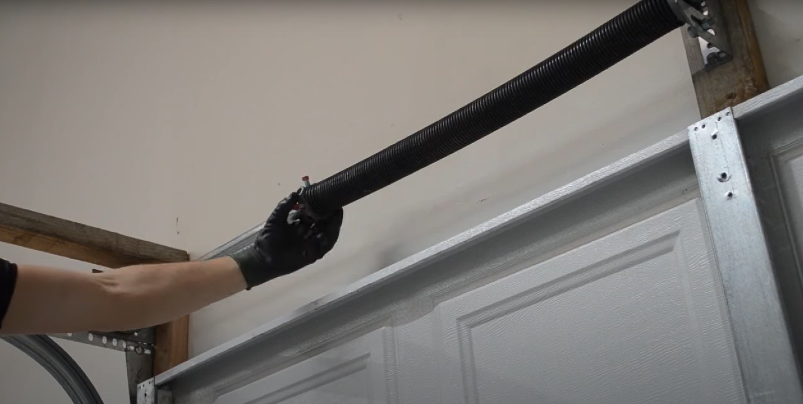 Garage door spring repair by experts technician of Garage Door Repair Downtown Sarasota FL.