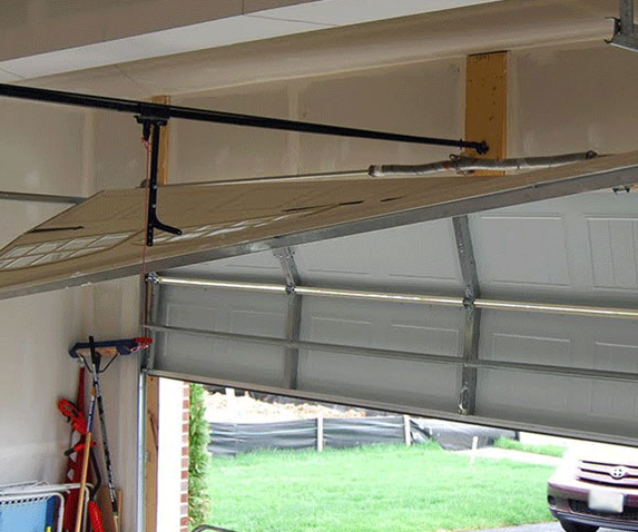 Off-Track Door & Heavy Cable Repair